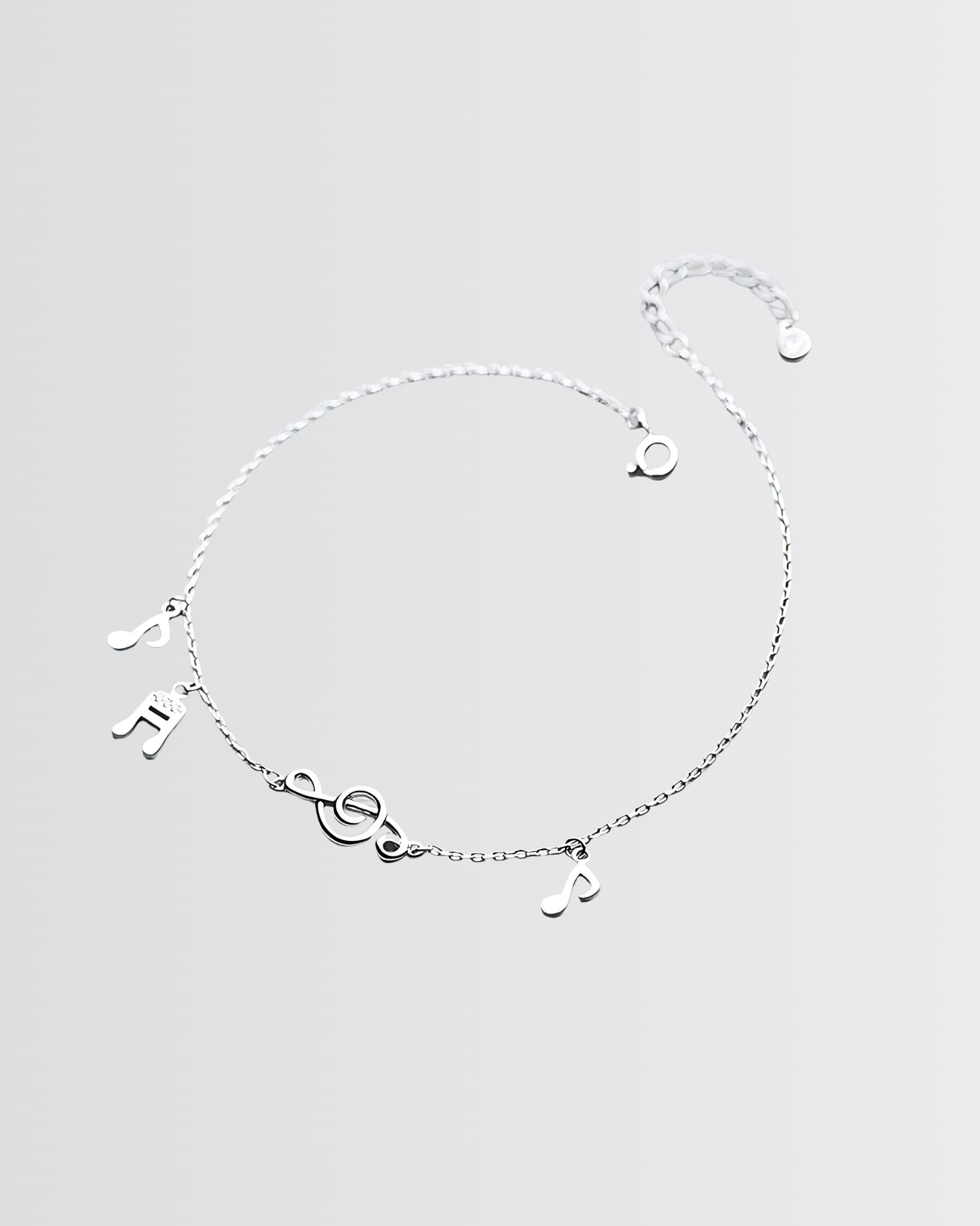Mon bracelet de cheville avec des notes de musique
