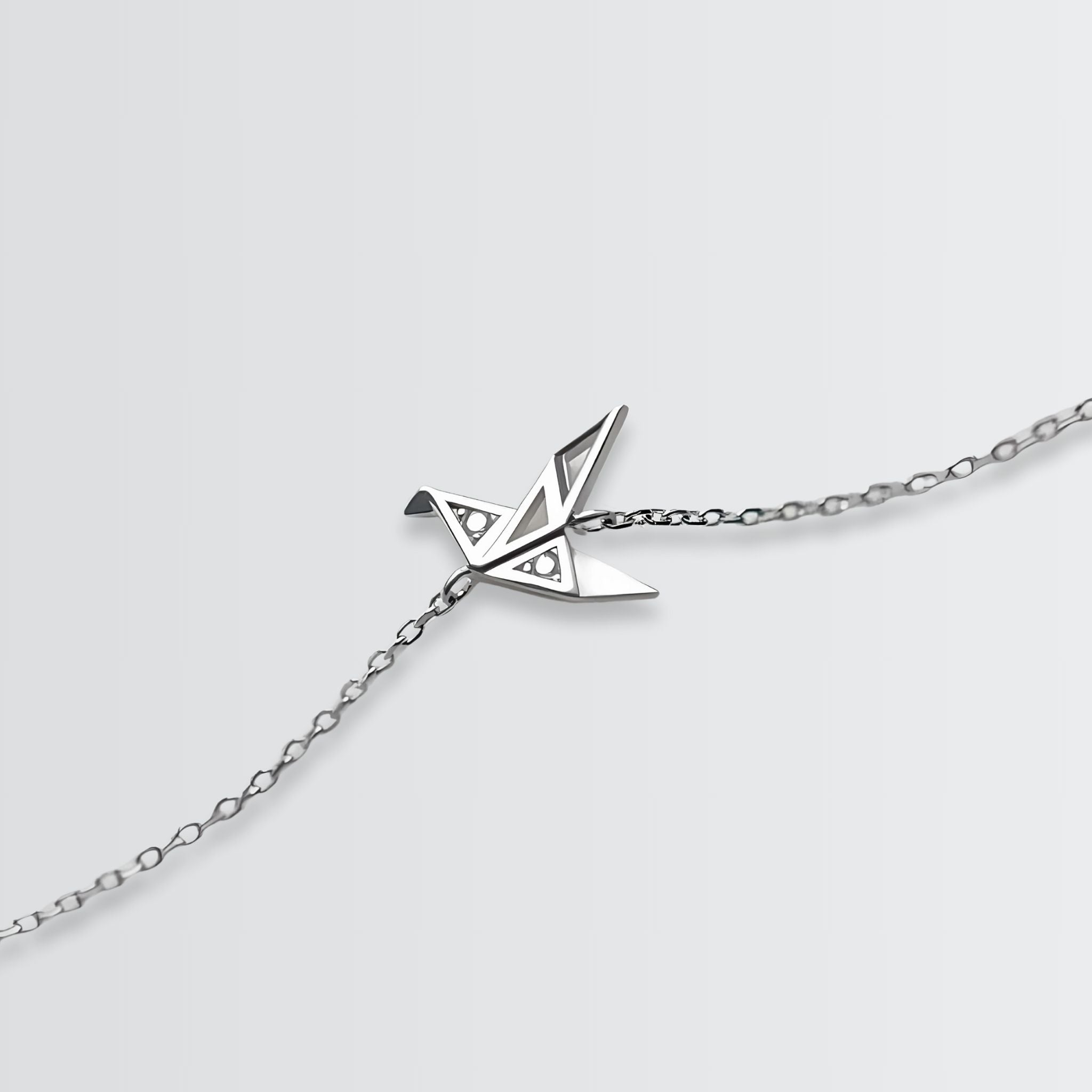 Bracelet minimaliste en origami avec oiseau