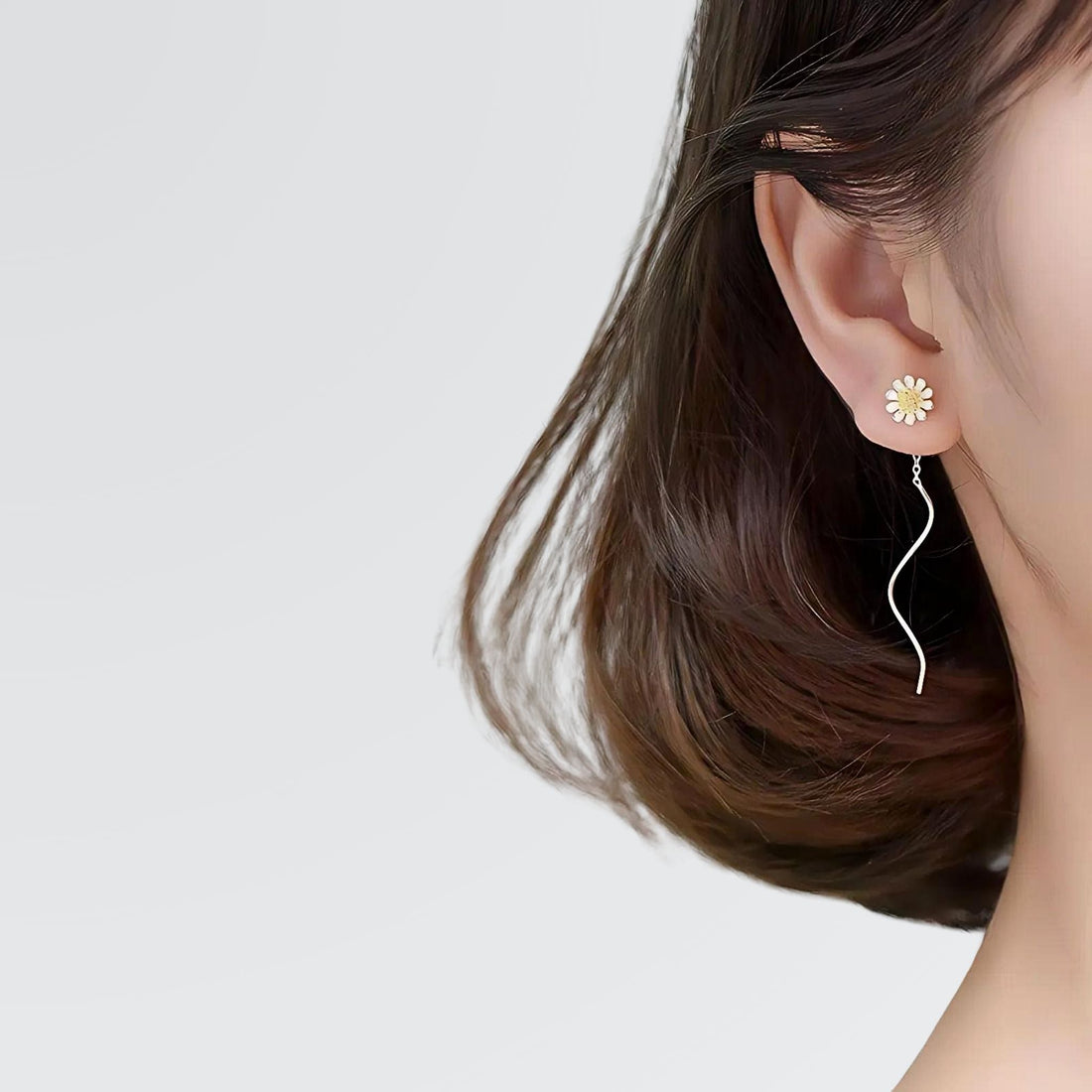 Pendientes de dalia en enredadera