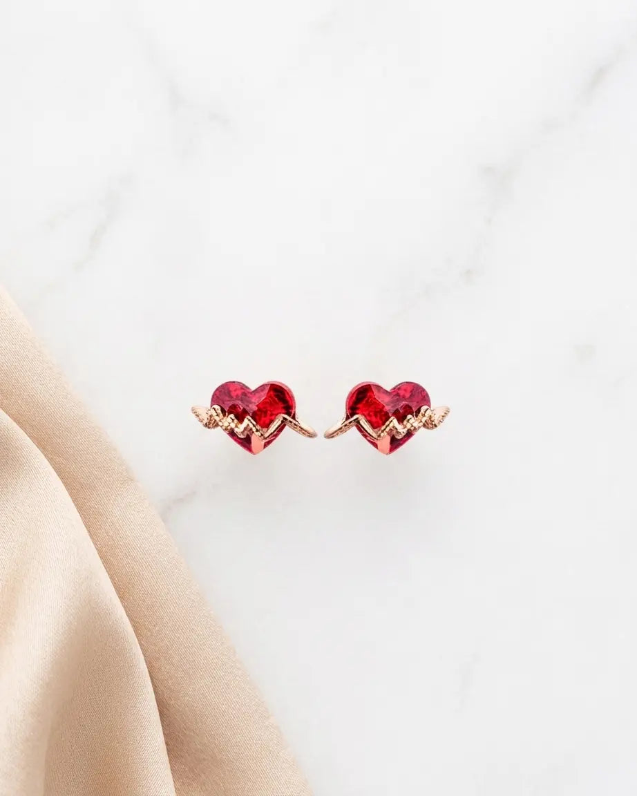 Heartflow Mini Studs - Silver Earrings by BLINGLANE