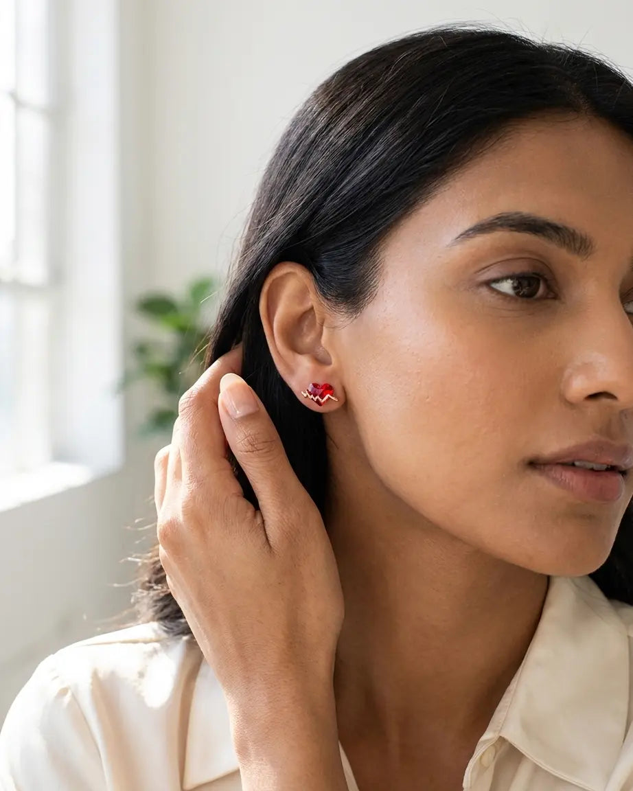 Heartflow Mini Studs - Silver Earrings by BLINGLANE
