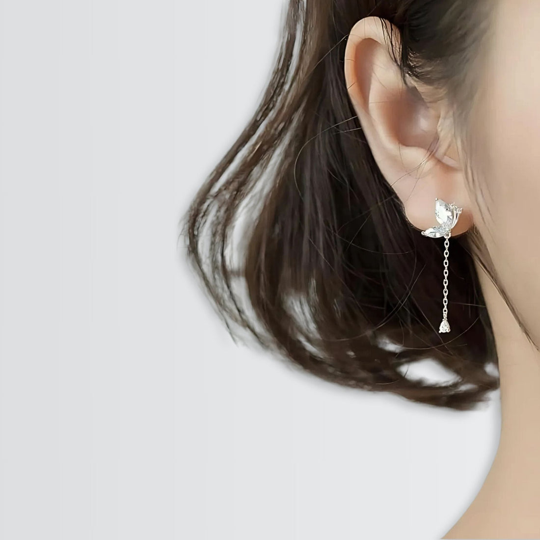 Pendientes de cadena con forma de mariposa y purpurina