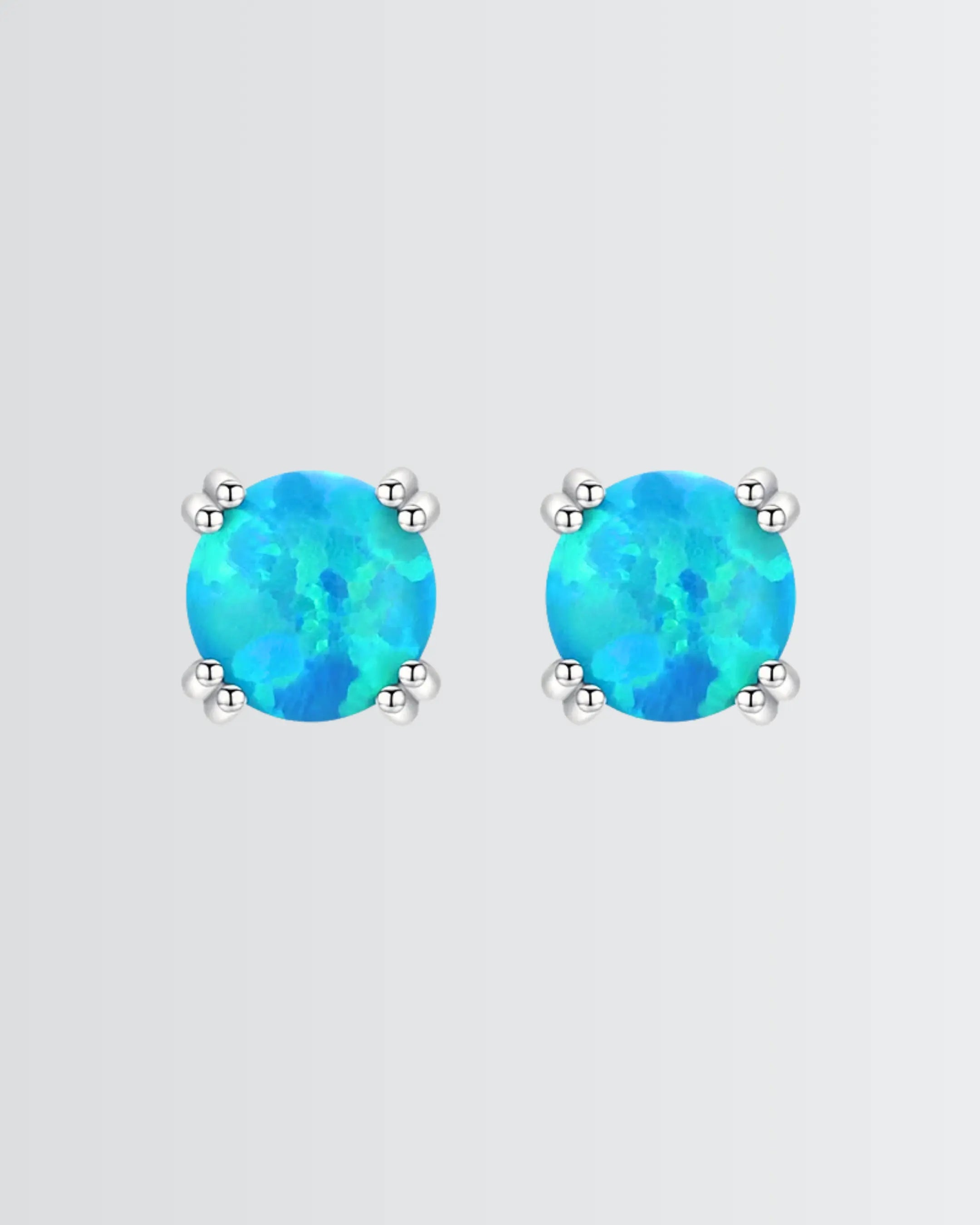 Let Your Ears Catch The Glow Studs - Silver Earrings by BLINGLANE
