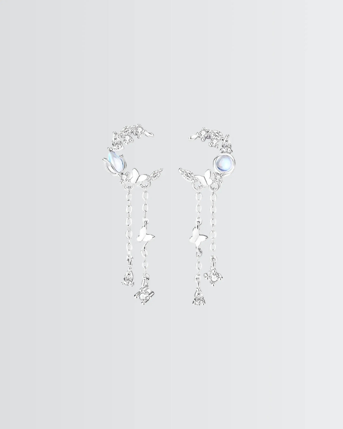 Flutter Glow Tassel Earrings -  Silver Earrings by BLINGLANE