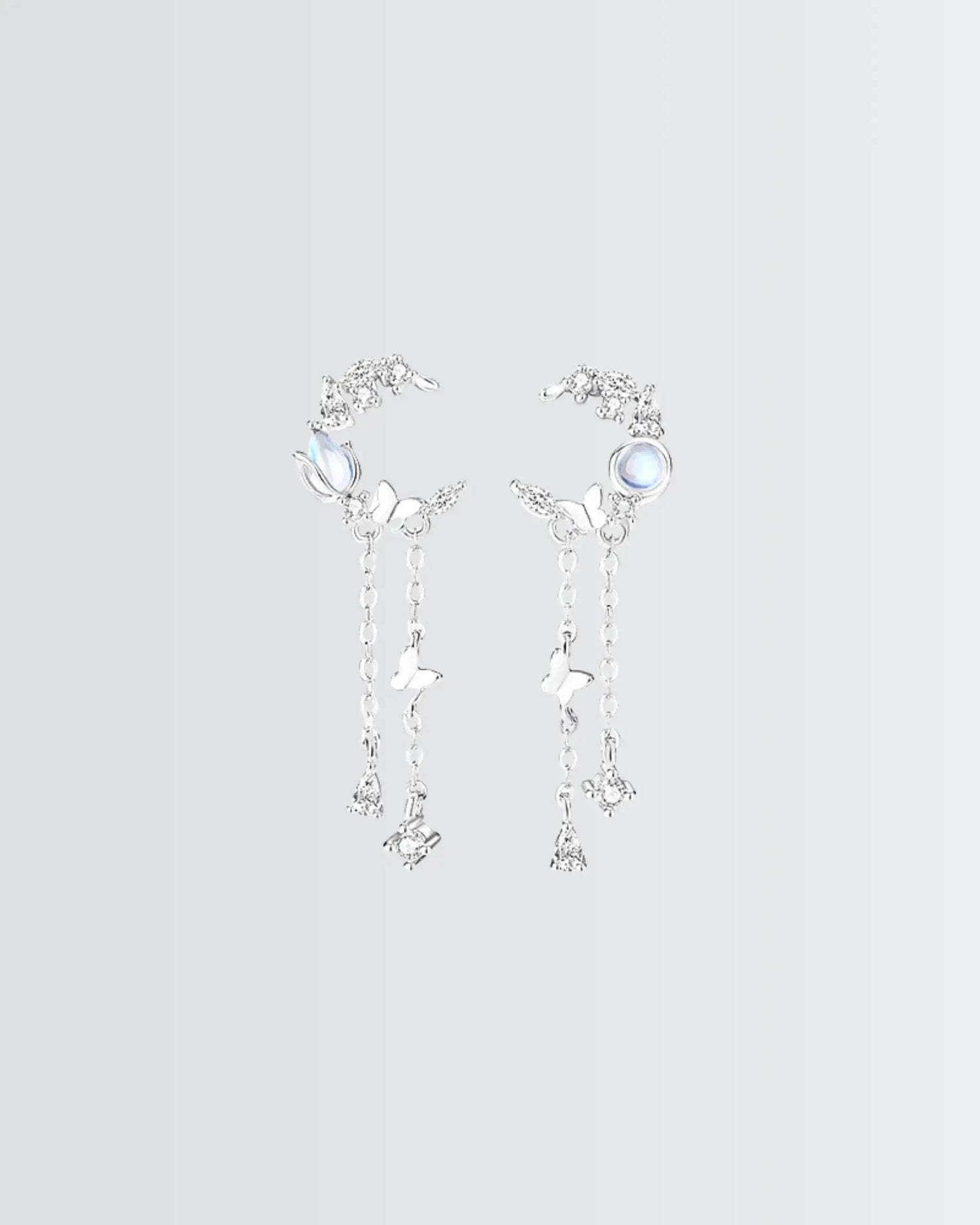 Flutter Glow Tassel Earrings -  Silver Earrings by BLINGLANE