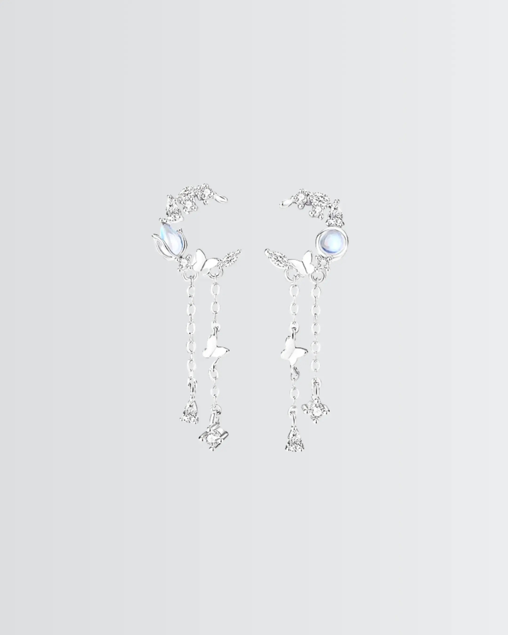 Flutter Glow Tassel Earrings -  Silver Earrings by BLINGLANE