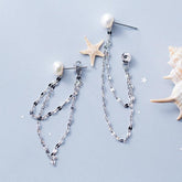 Posh Dangly Pearl Earrings - Blinglane